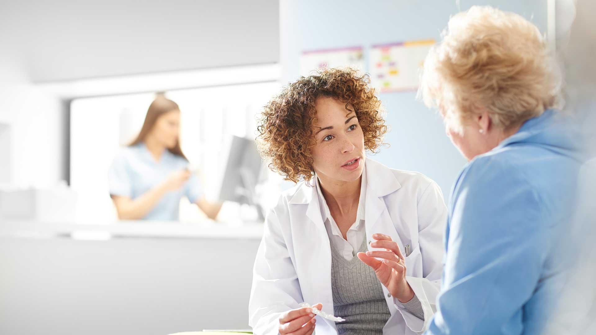 Doctor talking to patient